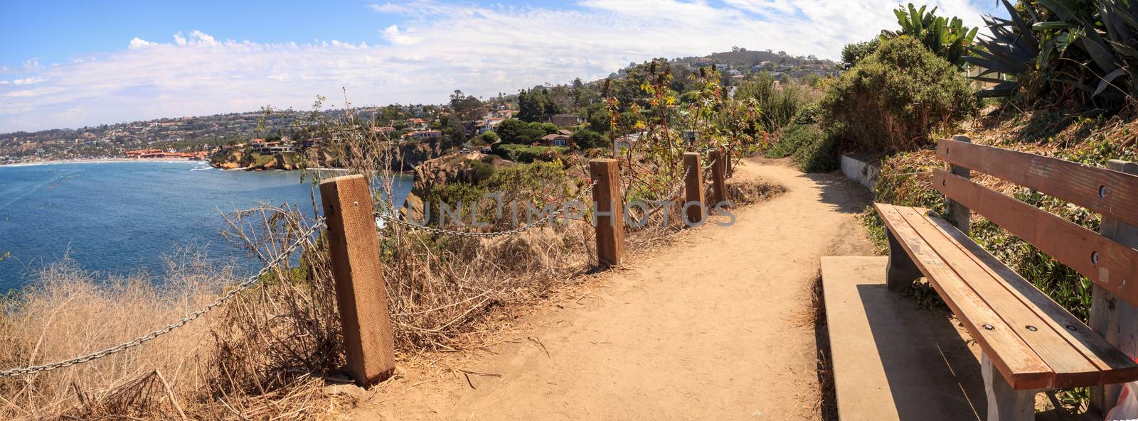 Hiking trails and benches above the coastal area of La Jolla Cove in Southern California in summer on a sunny day