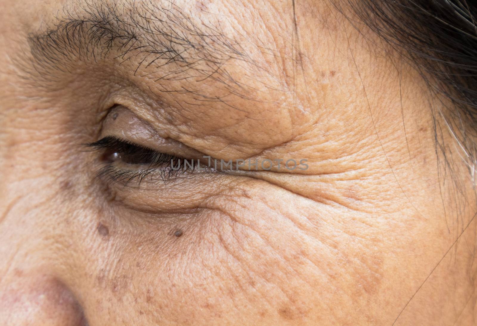 Closeup face wrinkle old women, aging and skin care concept