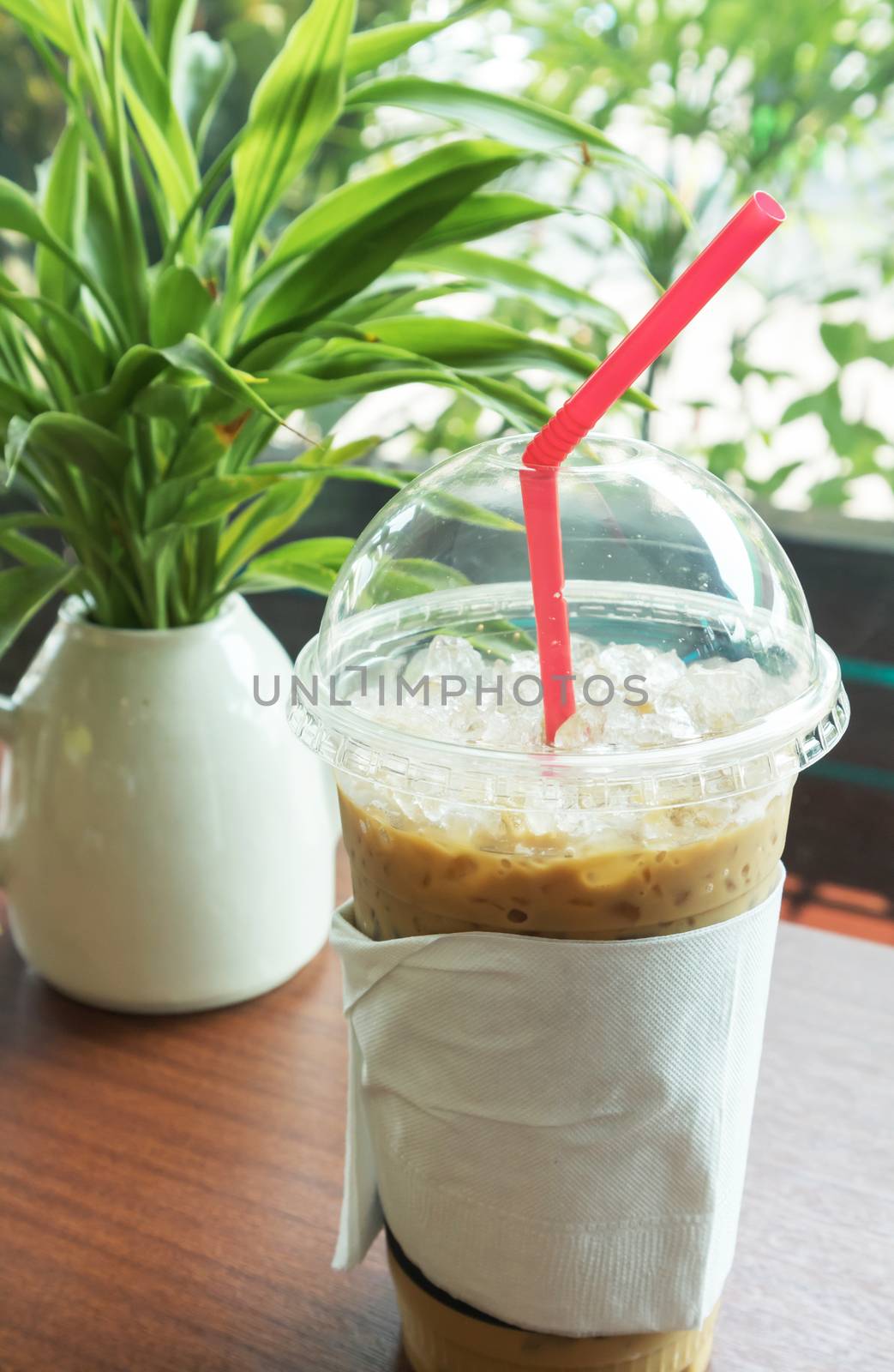 Ice coffee on wood table espresso ice coffee, relax time by pt.pongsak@gmail.com