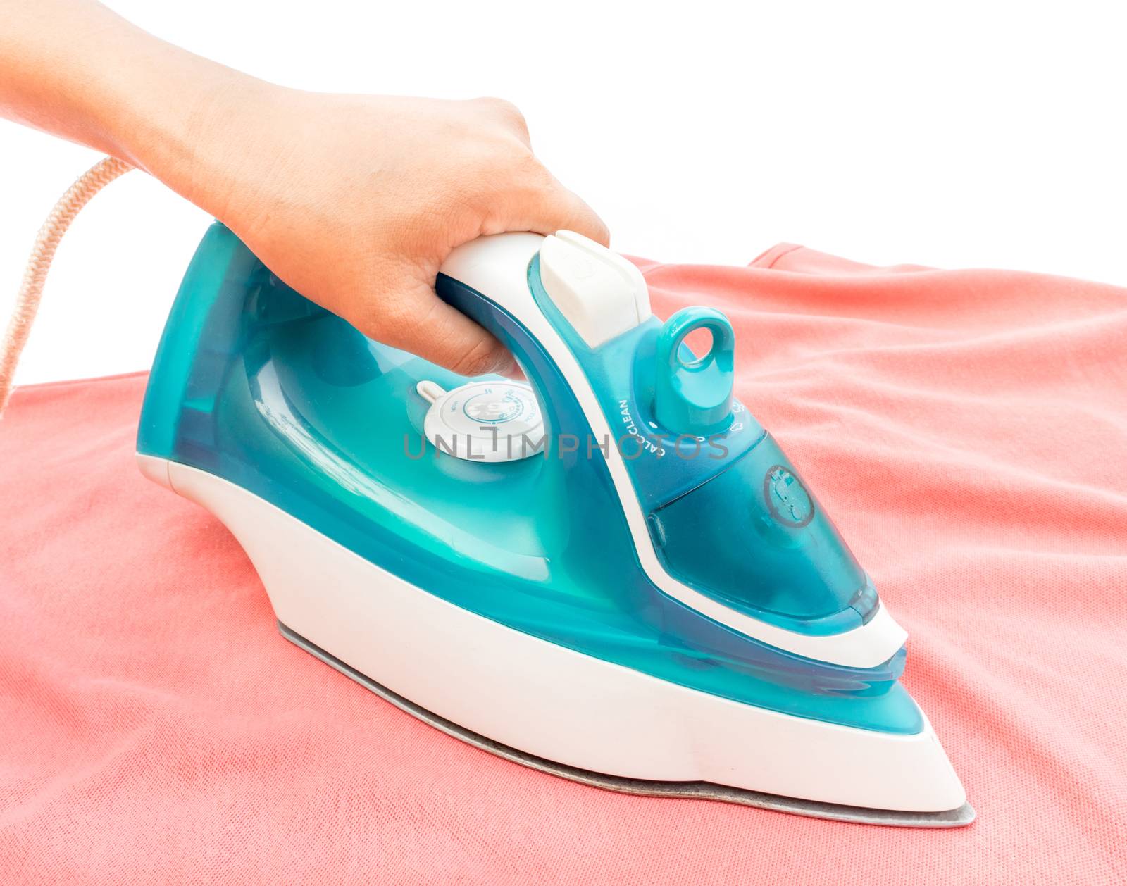 Woman ironing with red clothes