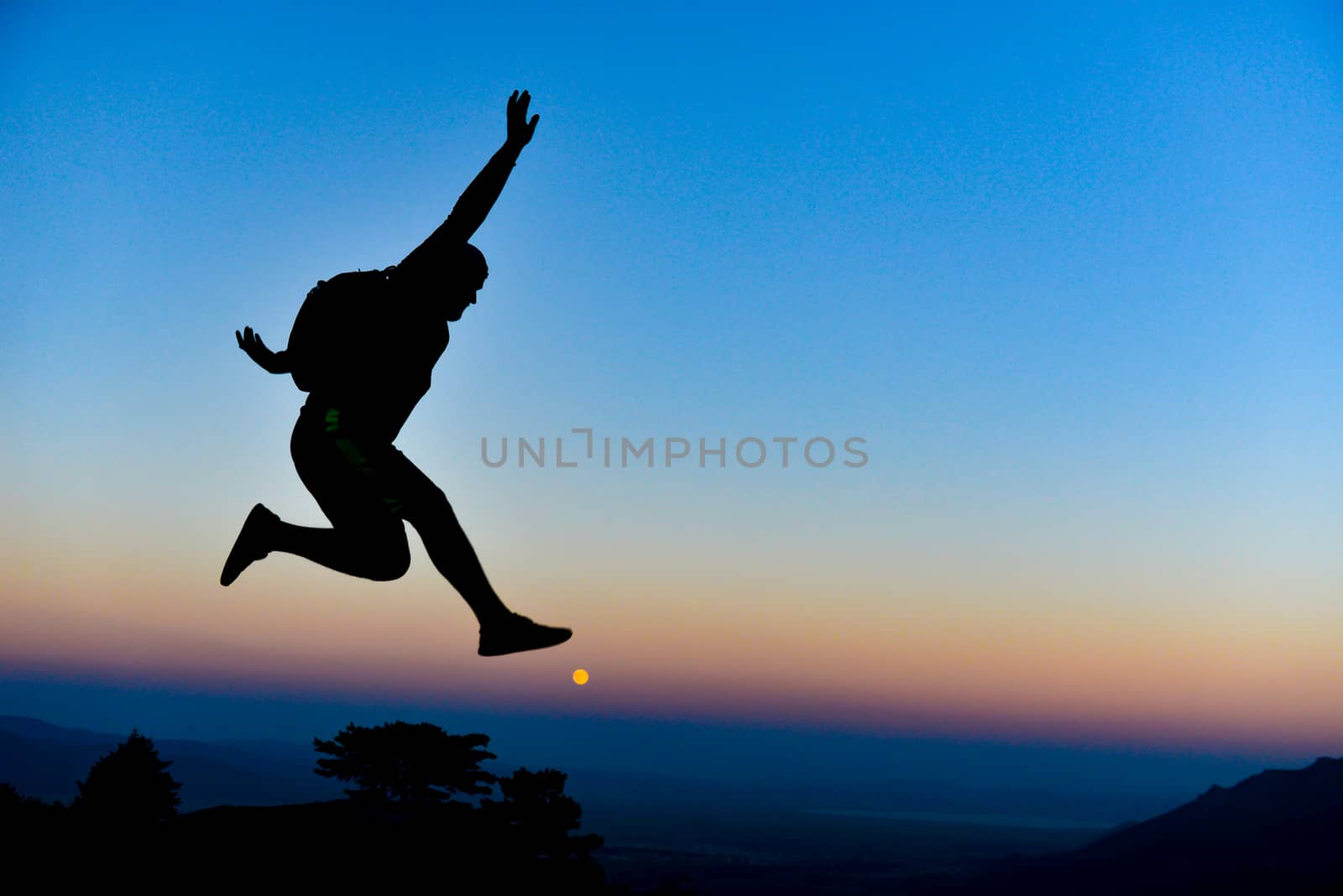 creative and energetic man jumping