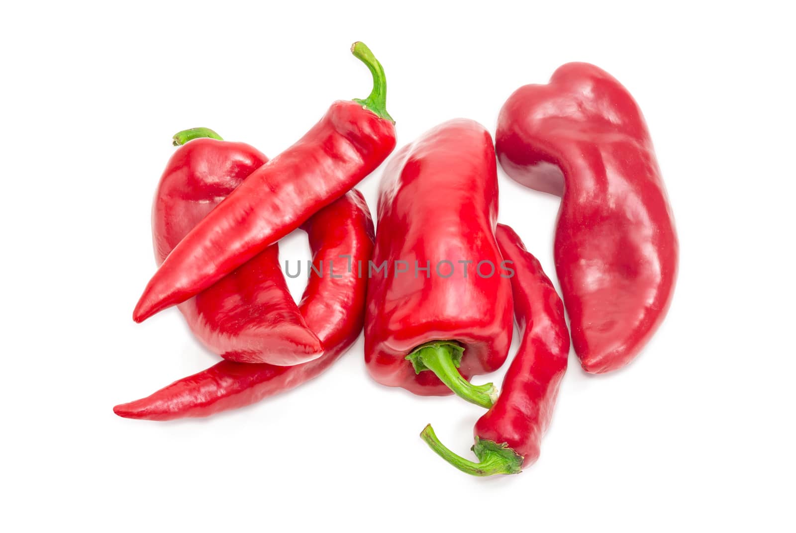 Red bell peppers and chili on a white background by anmbph