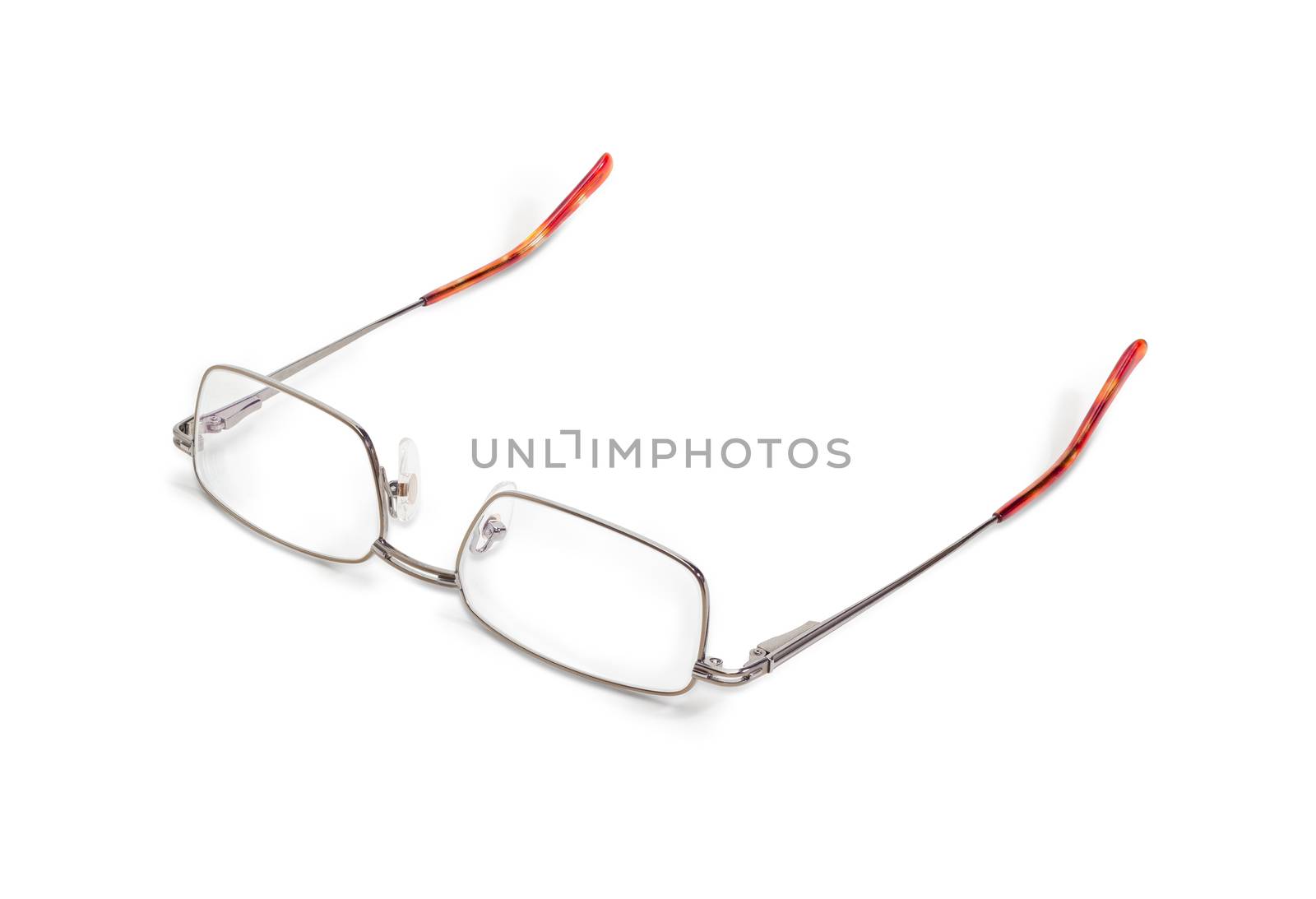 Modern pair of the classic mens eyeglasses in metal frame on a white background
