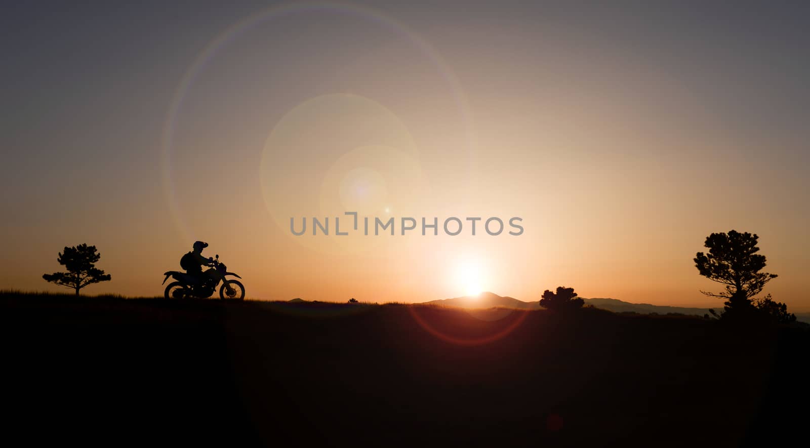 watching the sunrise at break motorcyclist by crazymedia007