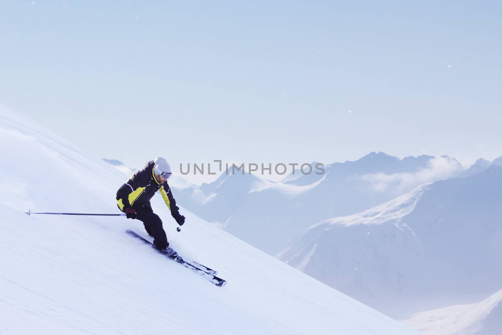 Skier in high mountains by destillat