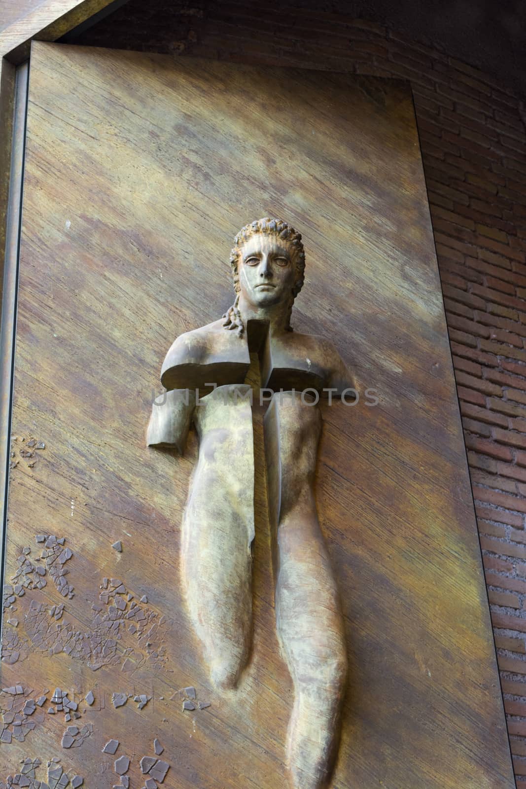 Statue on the door of the Basilica of St. Mary of the Angels and the Martyrs. The basilica is dedicated to the Christian martyrs, known and unknown.