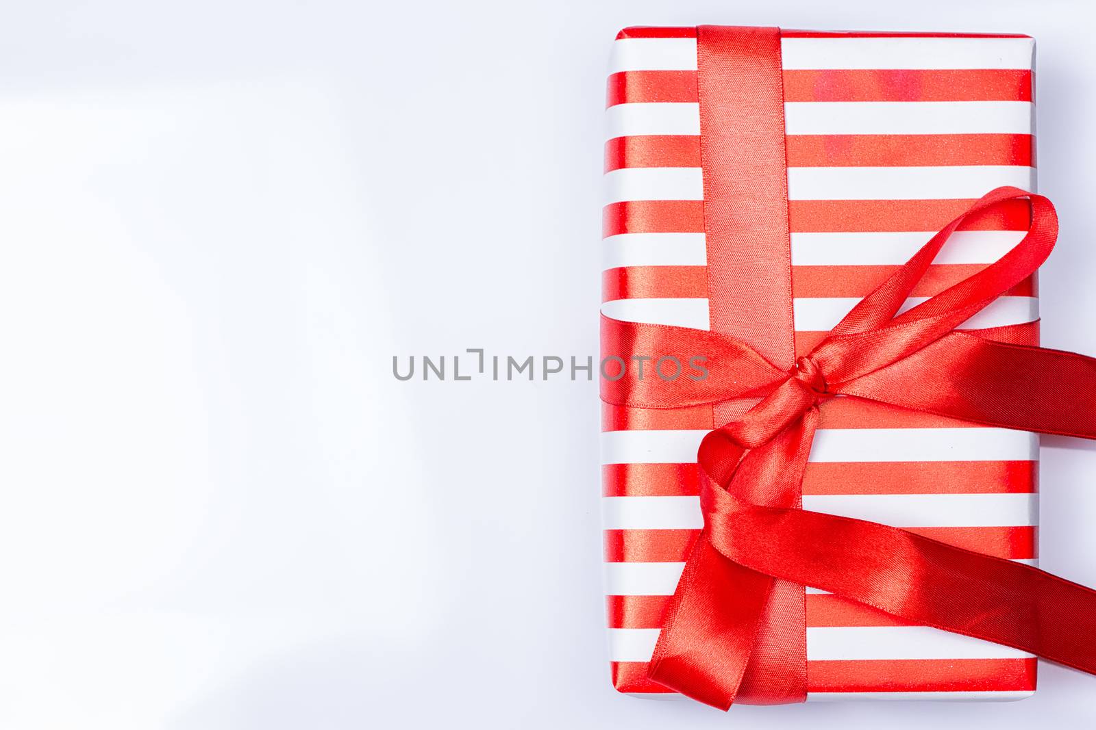 Red gift box with ribbon by victosha