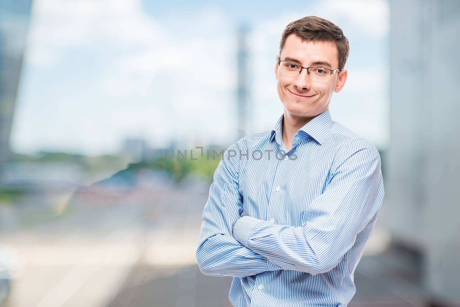 Smiling entrepreneur posing in office