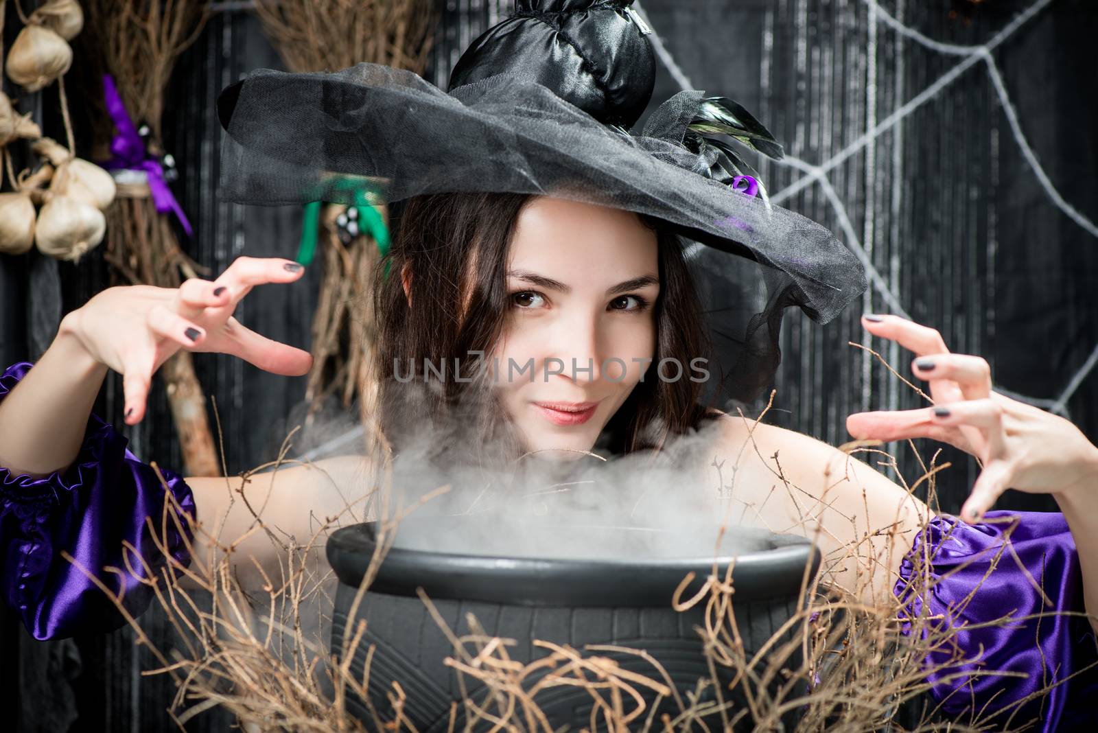 A brunette with brown eyes in the image of a witch above a cauld by kosmsos111