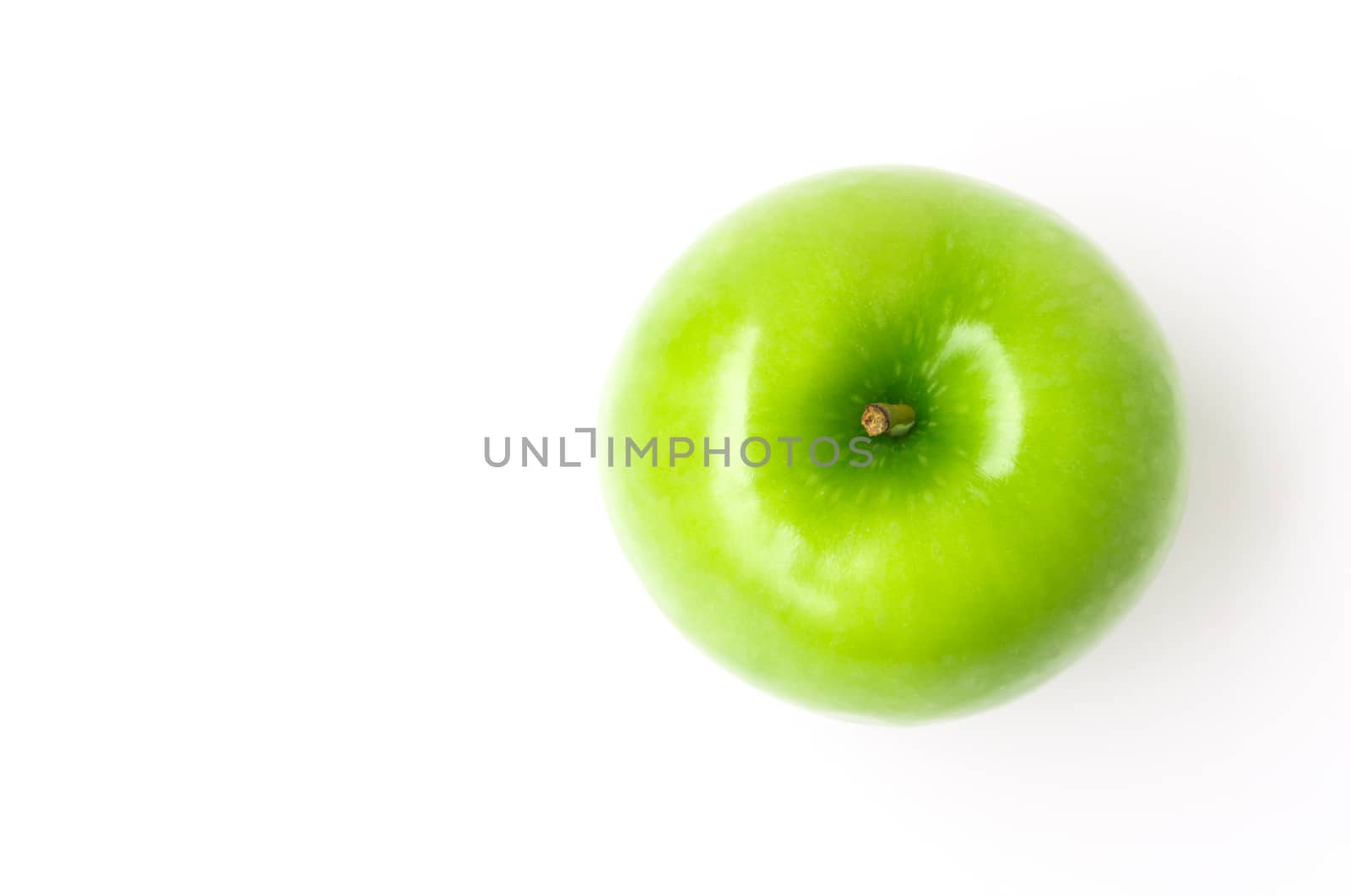 Closeup top view green apple on white background, fruit healthy concept