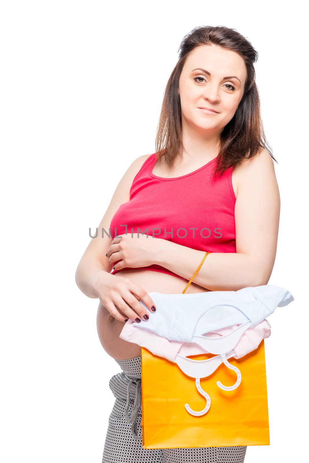 portrait of a pregnant woman with shopping bags on a white background