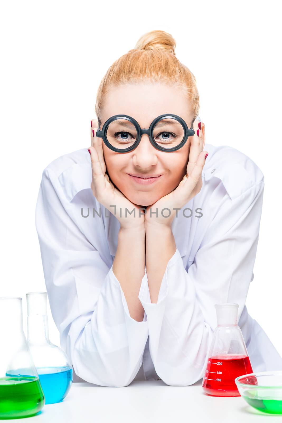 Vertical portrait of blond doctor chemist with test tubes on white background