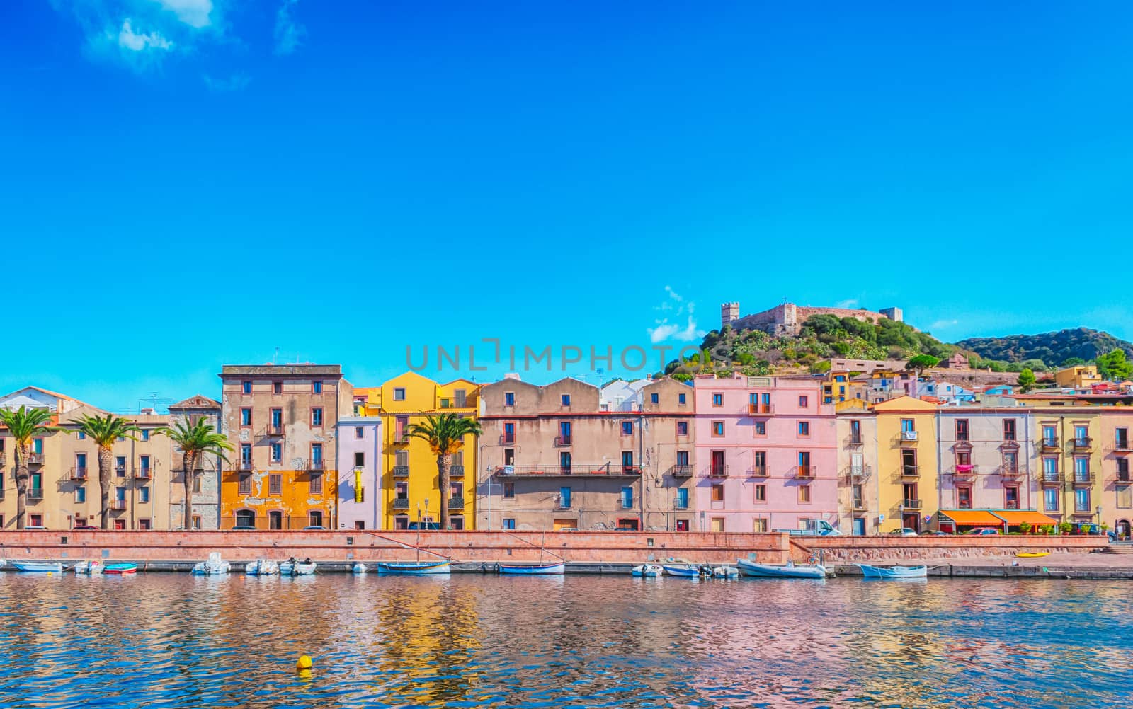 View of ancient village of Bosa on Temo river in a sunny morning of summer - Sardinia - Italy