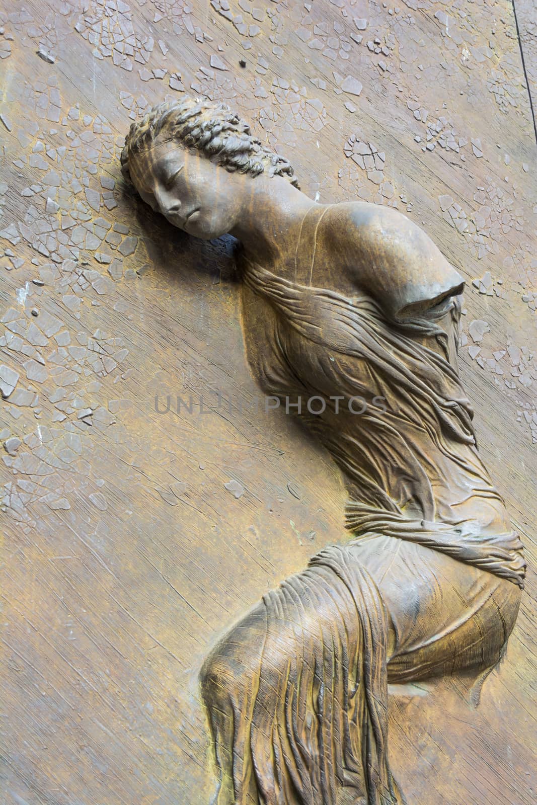 Bronze statue on the door of the Basilica of St. Mary of the Angels and the Martyrs - Rome, Italy by ankarb