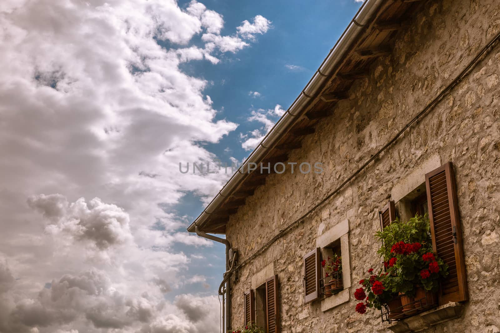 An exterior of an old stone house in Tuscany