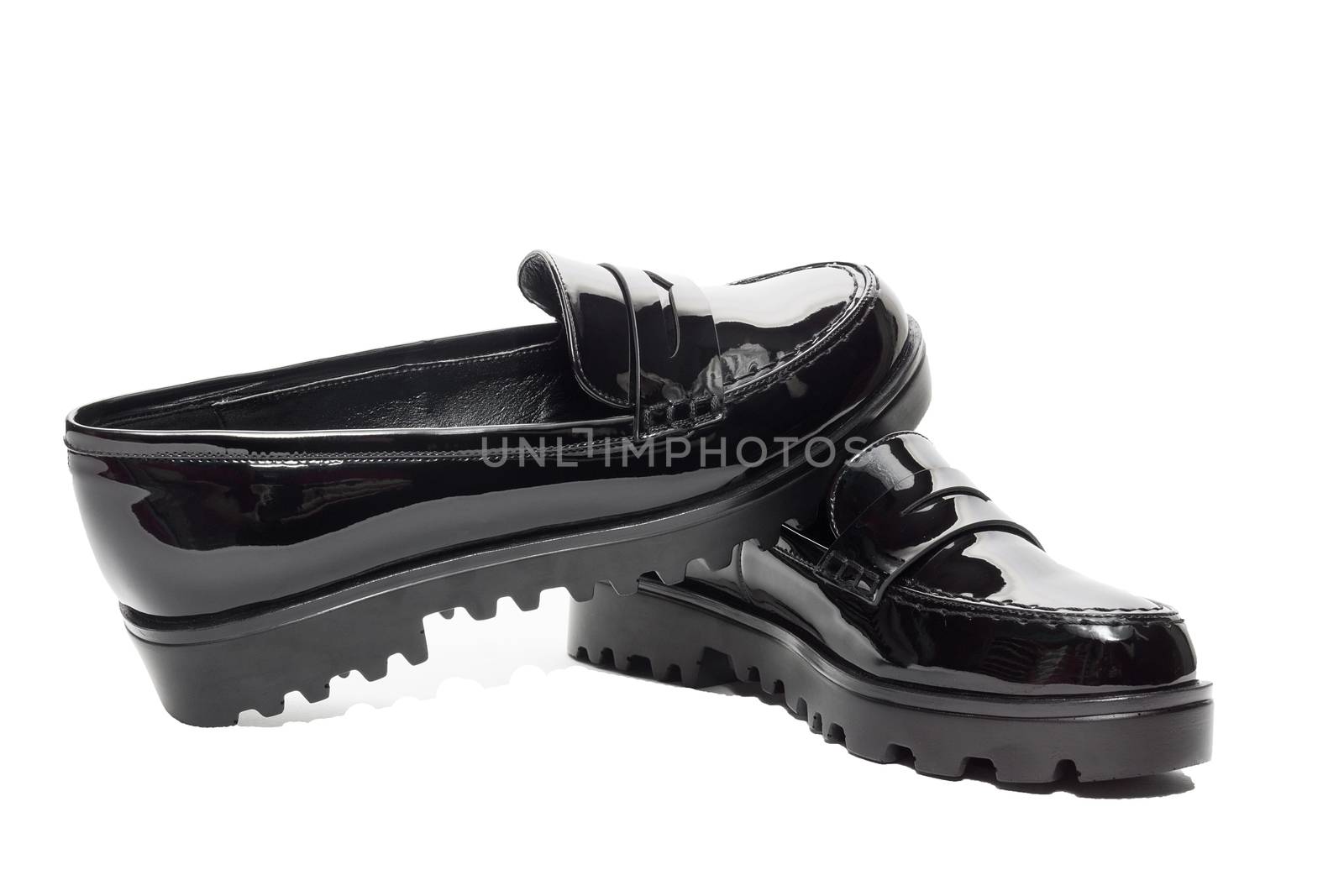 Female winter leather shoes on a white background, isolated, studio