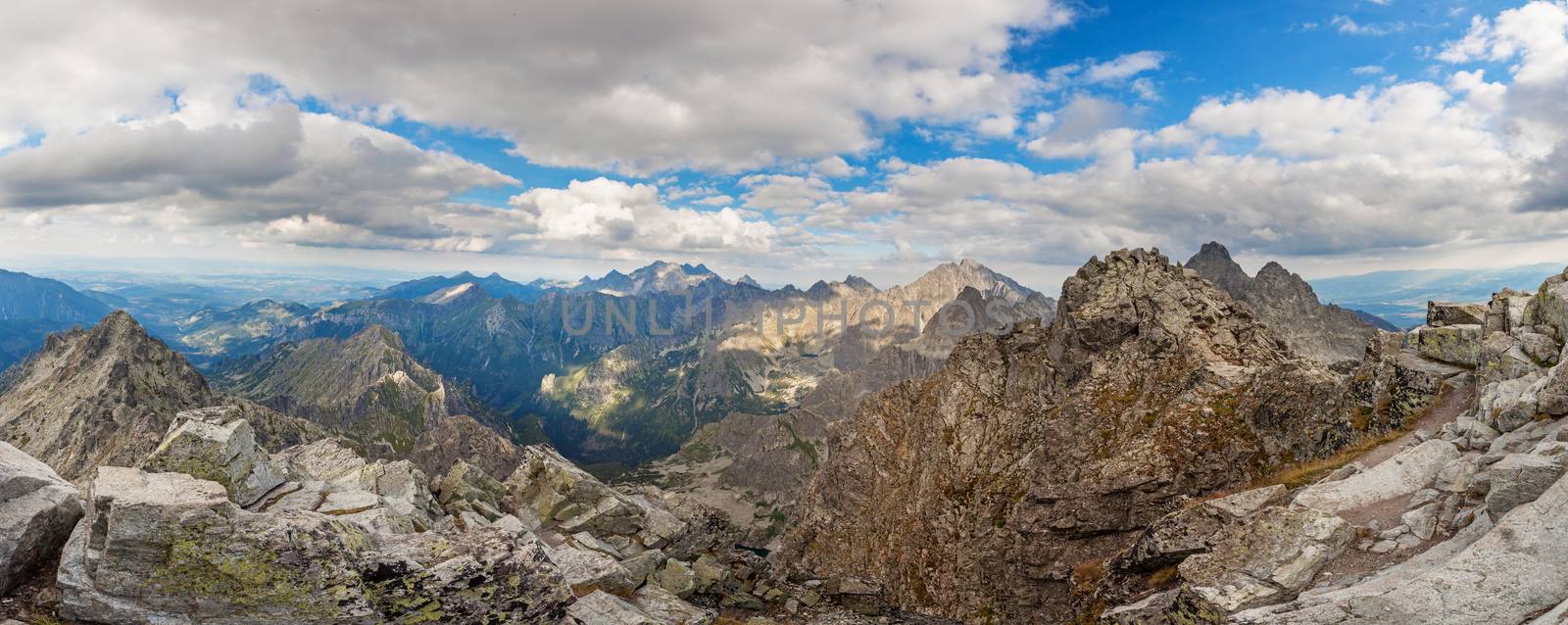 View on high Tatra Mountains from Rysy mountain with dramatic cloudy sky