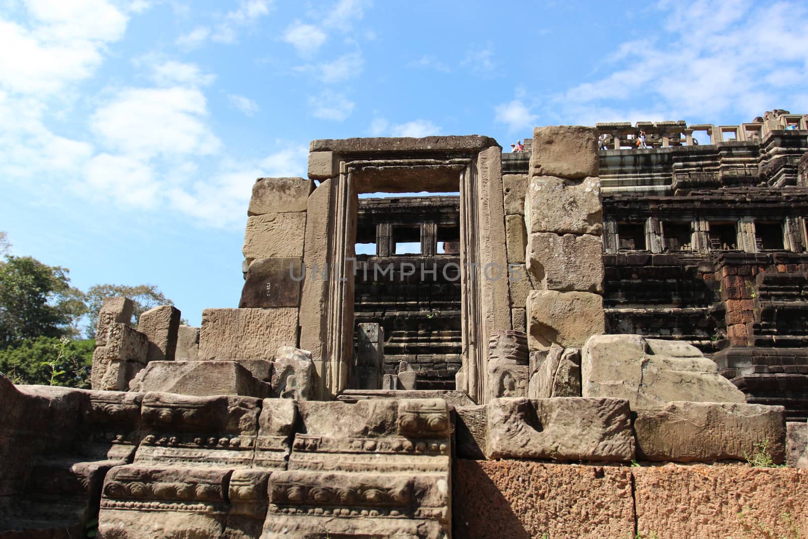 Window of the ancient temple in the complex of Angkor, near the ancient city of Siem Reap. 