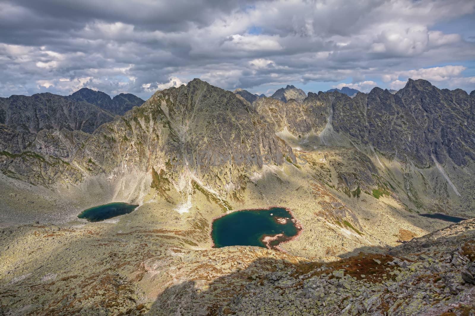 Panoramic photo of Mlynicka dolina and Capie pleso, with a great view on High Tatra mountains.
