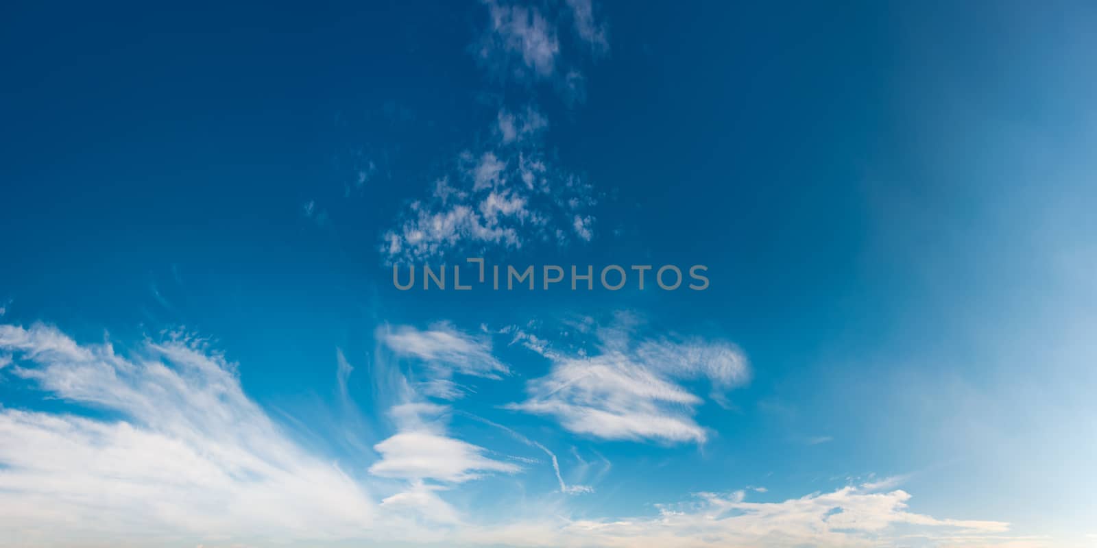beautiful cloud formation panorama on a blue sky. lovely nature background