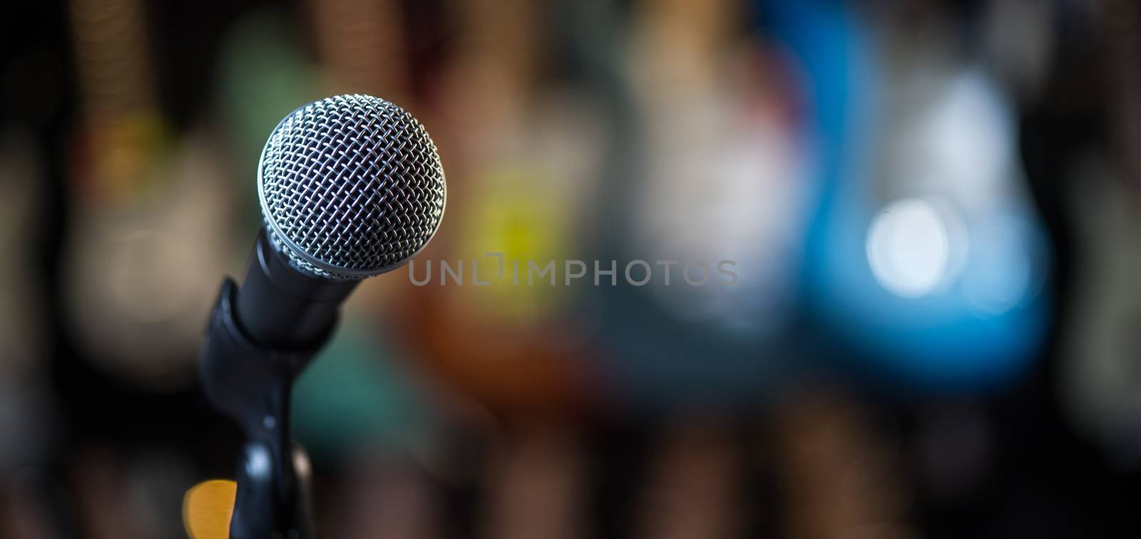 Microphone on stage against a background of auditorium, France