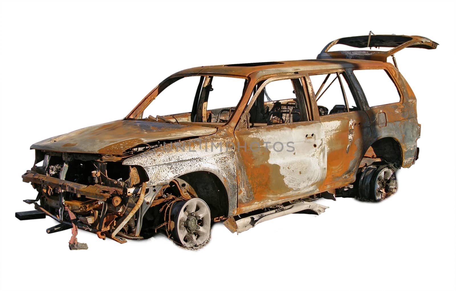 Photo illustration of a burned and rusted out car.