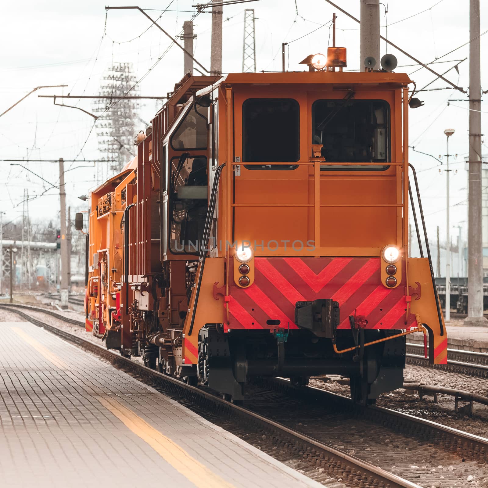 Ballast distributing and profiling track machine. Repair train