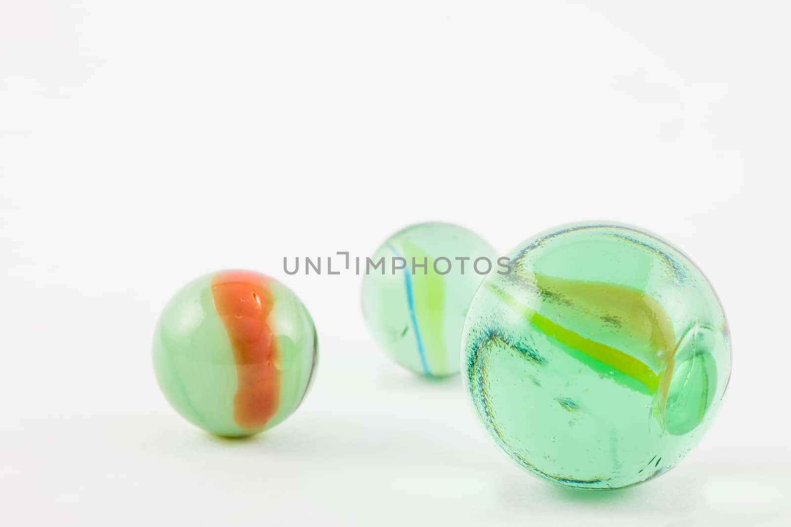 Glass marble balls isolated on white background