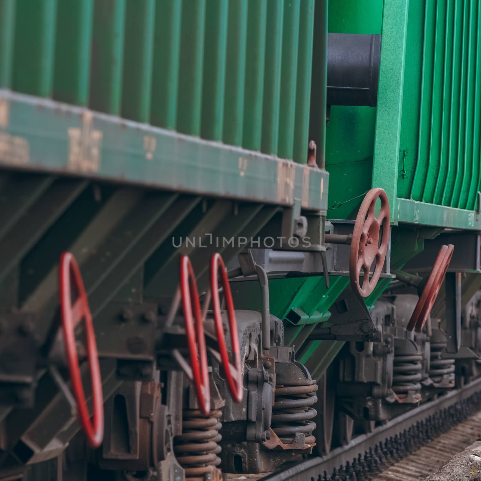 Green cargo wagons close up by sengnsp