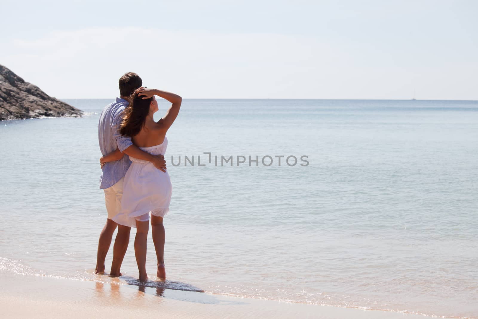 Couple looking at sea by ALotOfPeople