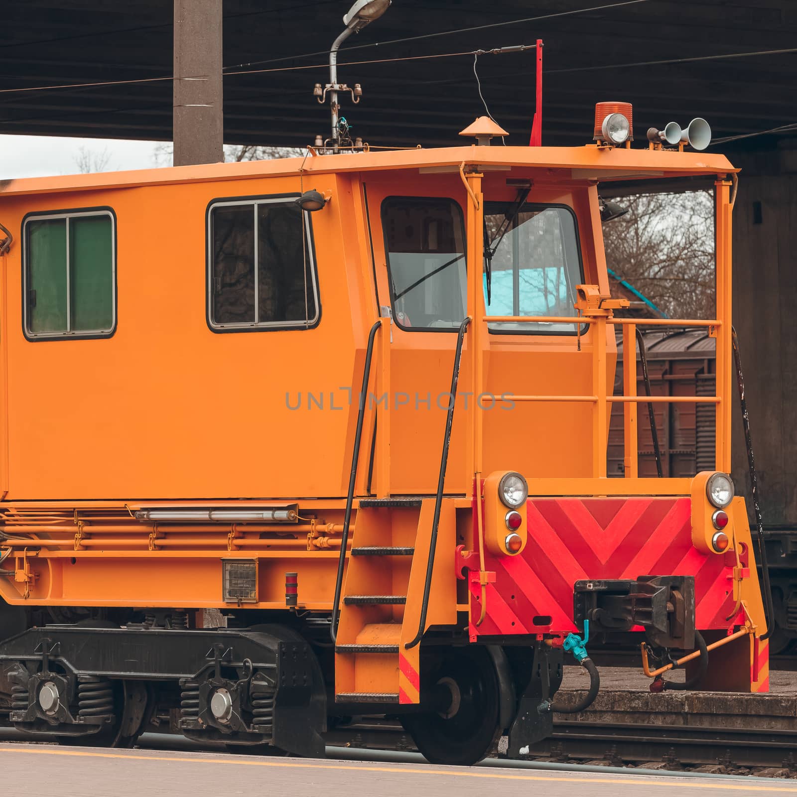 Ballast distributing and profiling track machine. Repair train