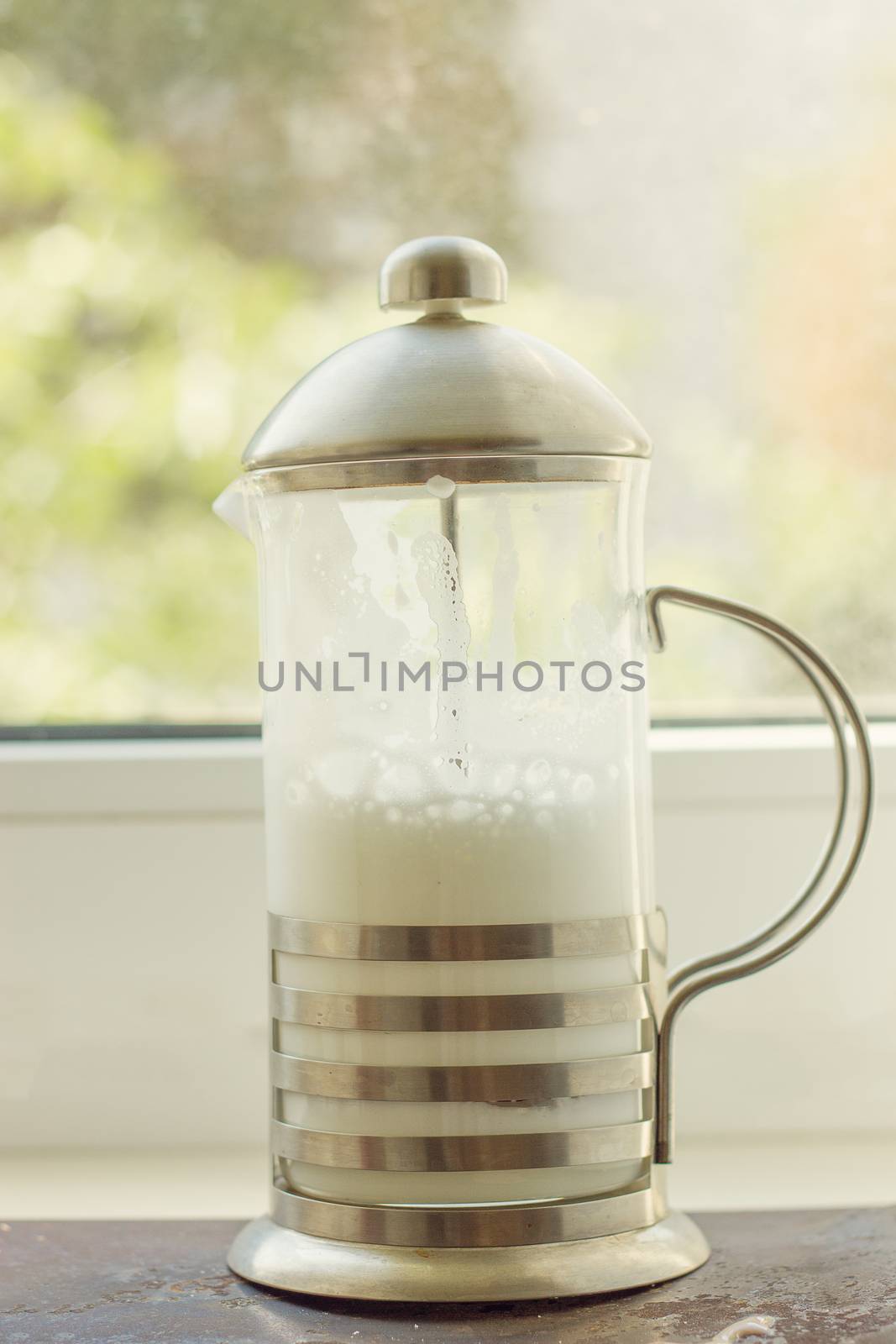 French press with whipped milk by victosha