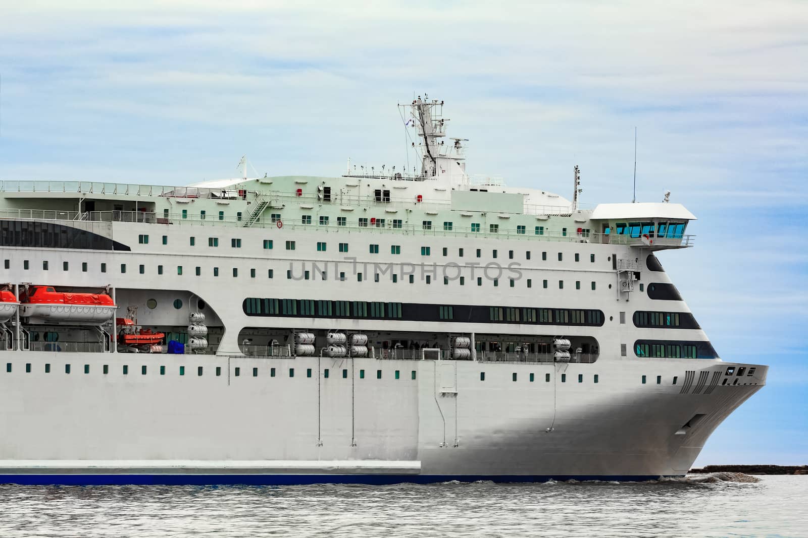 White cruise liner sailing on a clear day