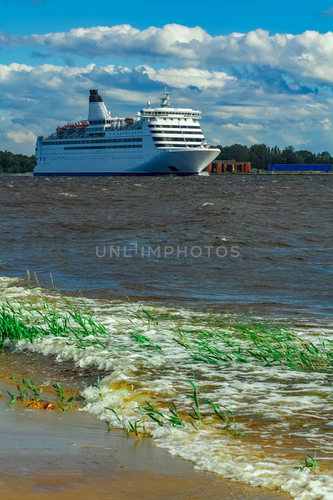 Big white cruise ship sailing to the Baltic sea at clear day