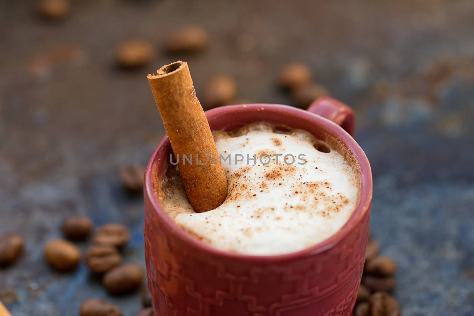 Hot chocolate with cinnamon stick as spoon