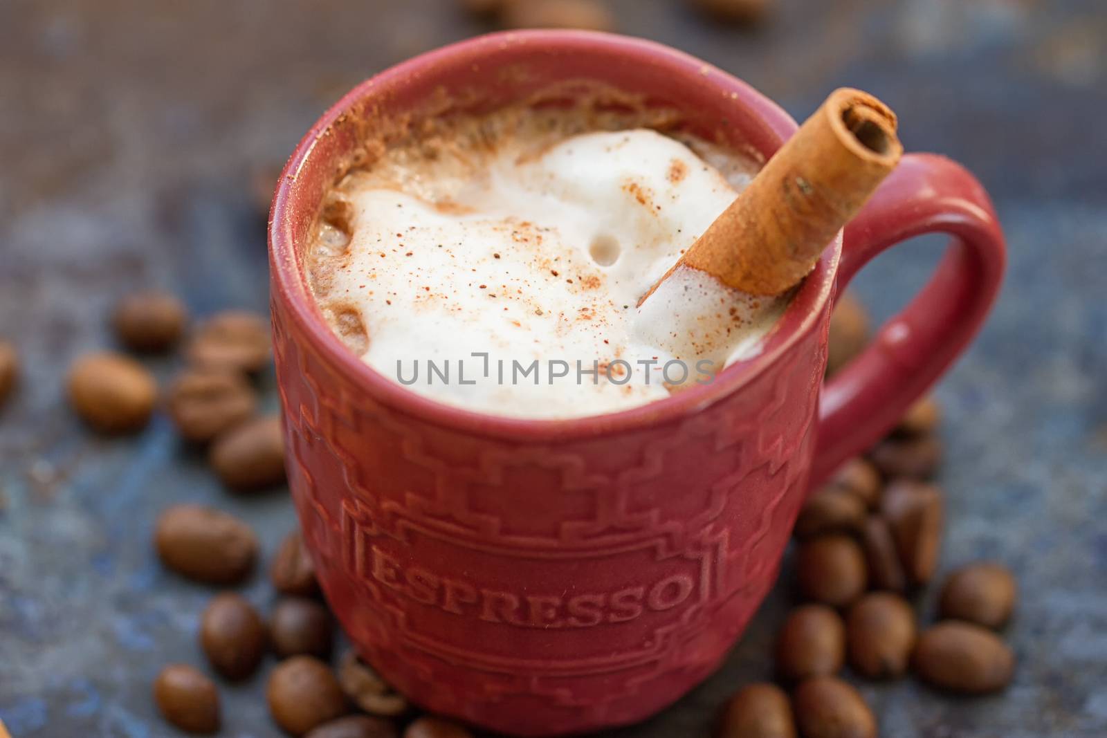 Hot chocolate with cinnamon stick as spoon