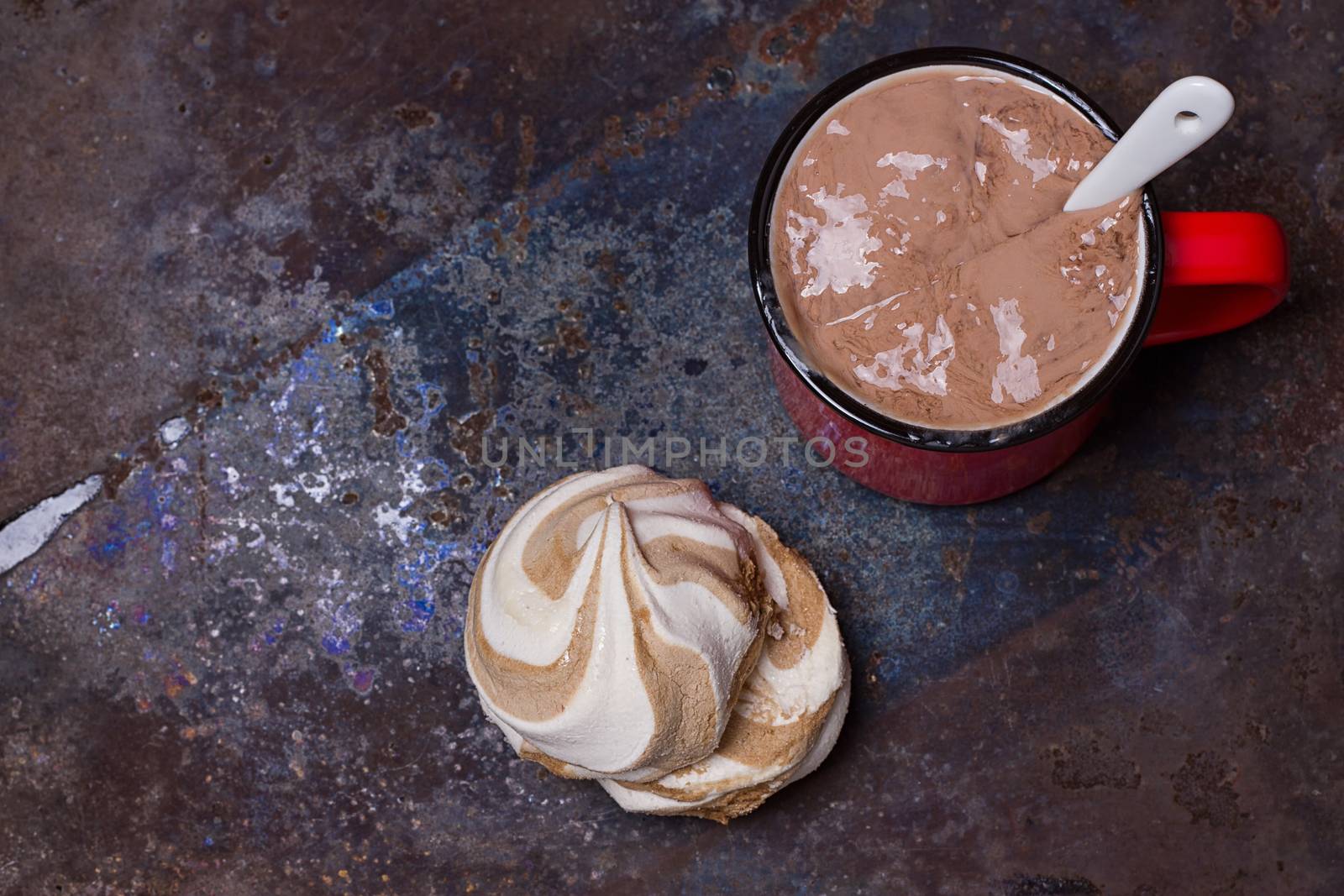 hot chocolate with marshmallows in a ceramic cup on grounge