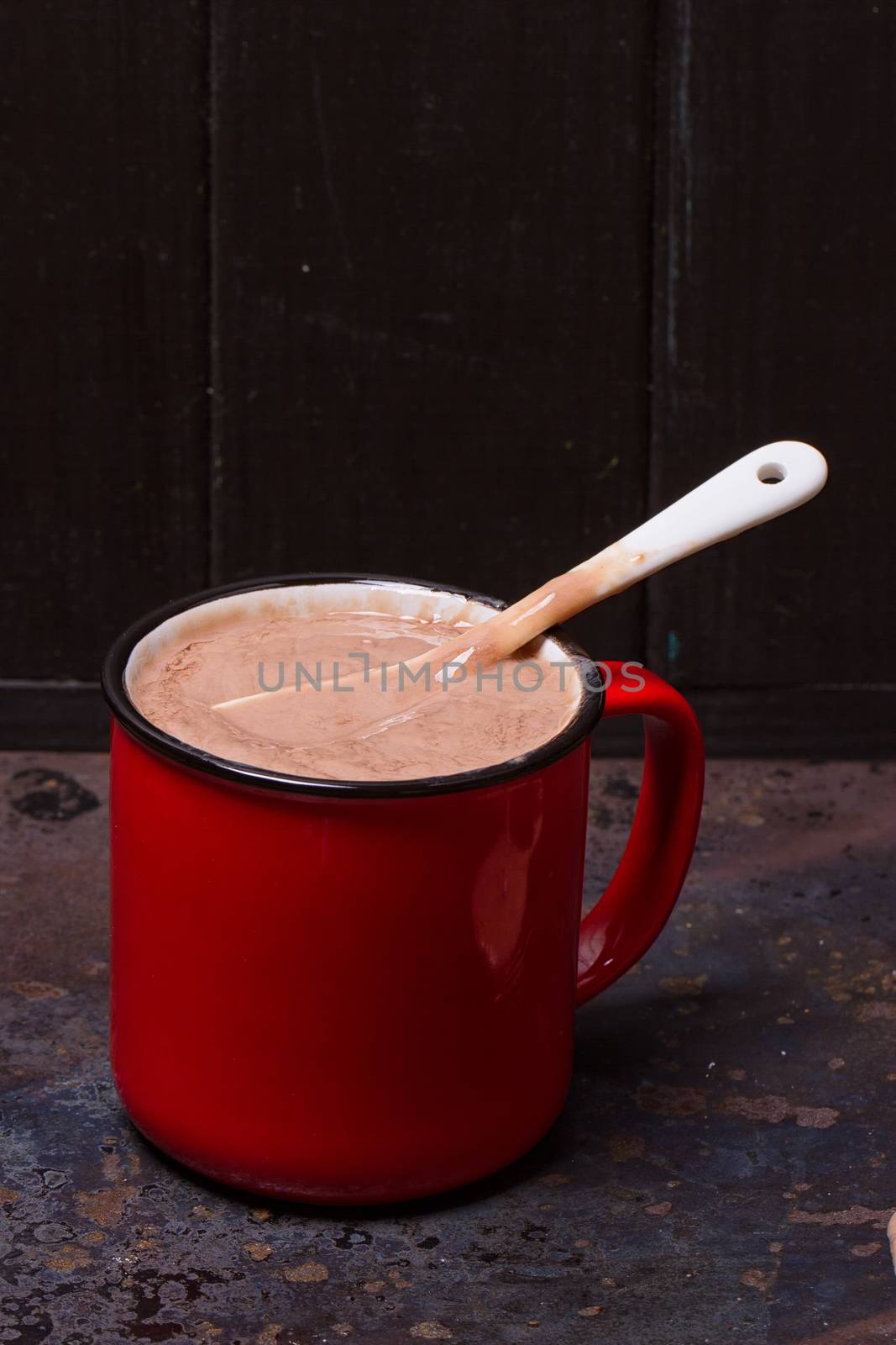 Hot chocolate in red mug by victosha