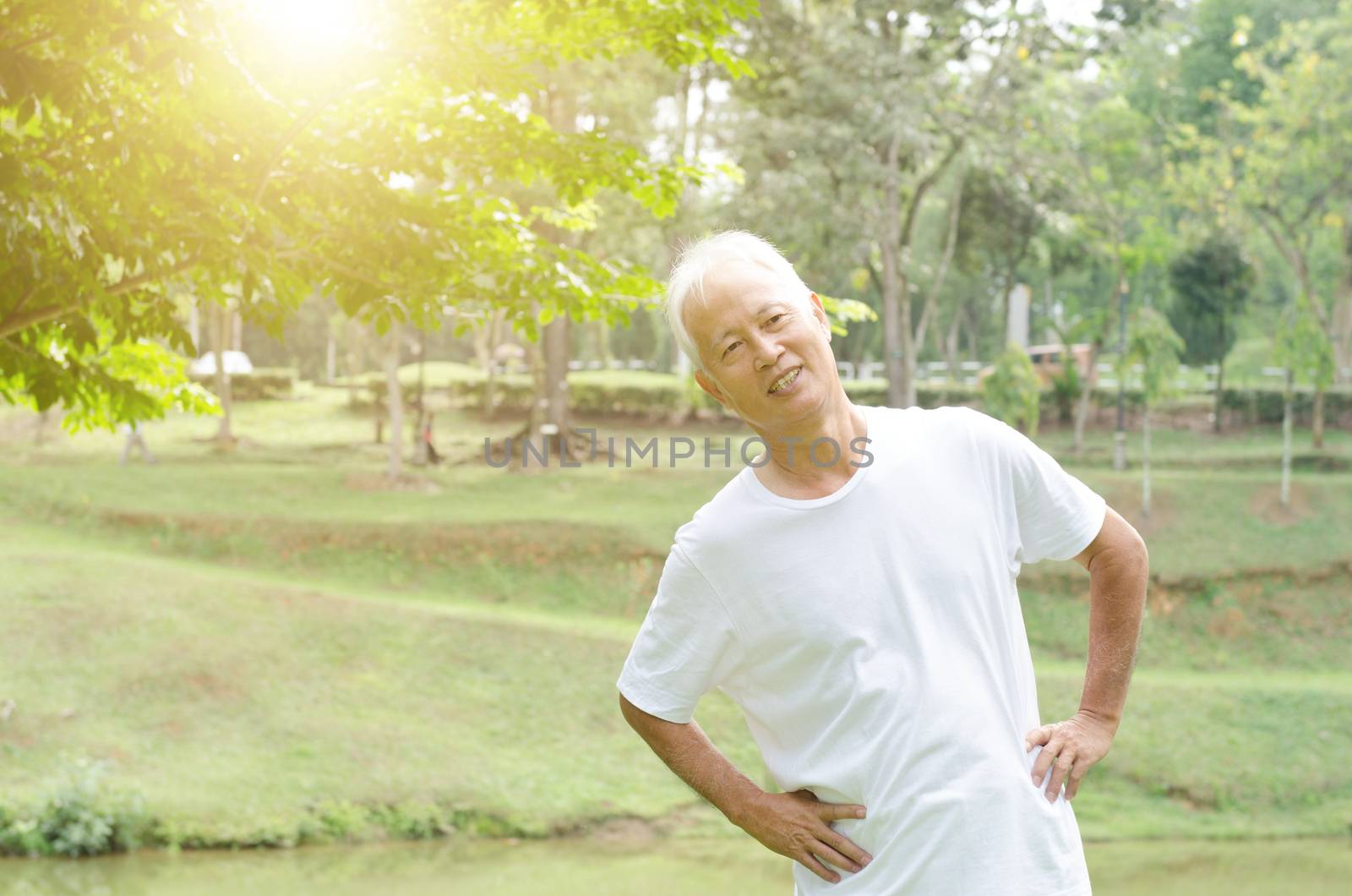 Senior people stretching outdoor  by szefei