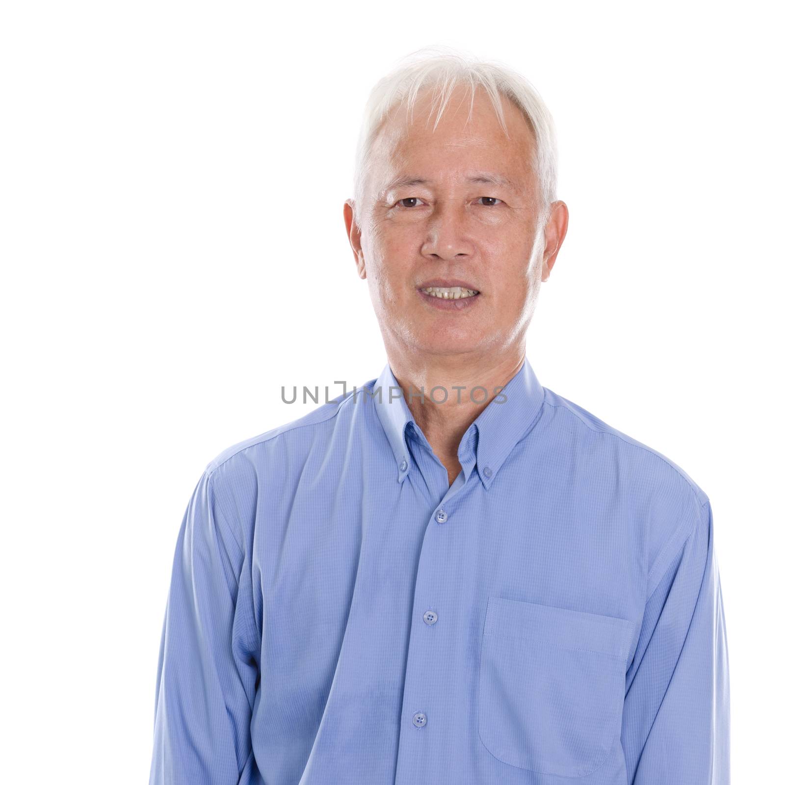 Portrait of old Asian senior man smiling, standing isolated on white background.