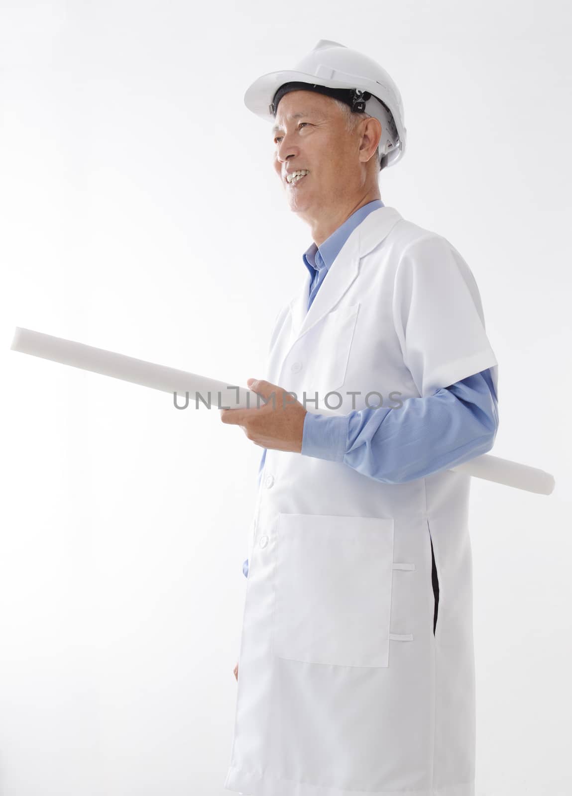 Portrait of Asian engineer with hard hat and blueprint smiling, standing isolated on white background.