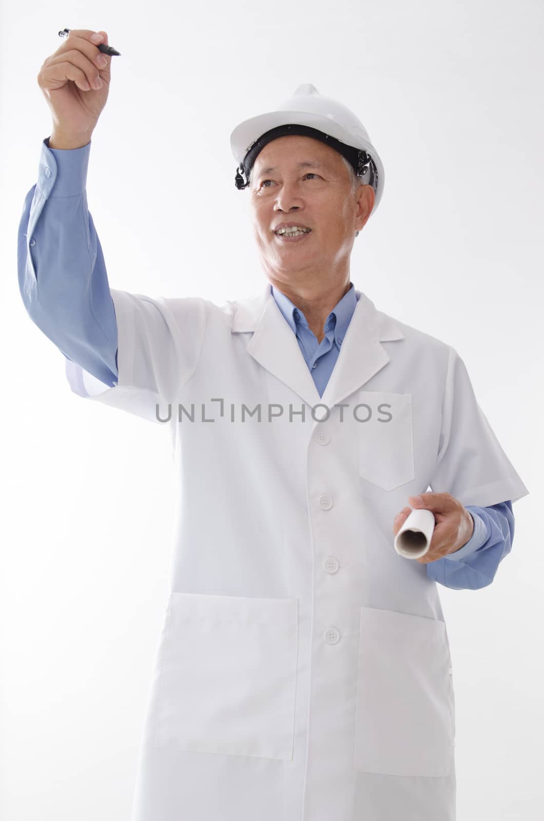 Portrait of Asian engineer with hard hat and blueprint, hand writing on blank space, standing isolated on white background.
