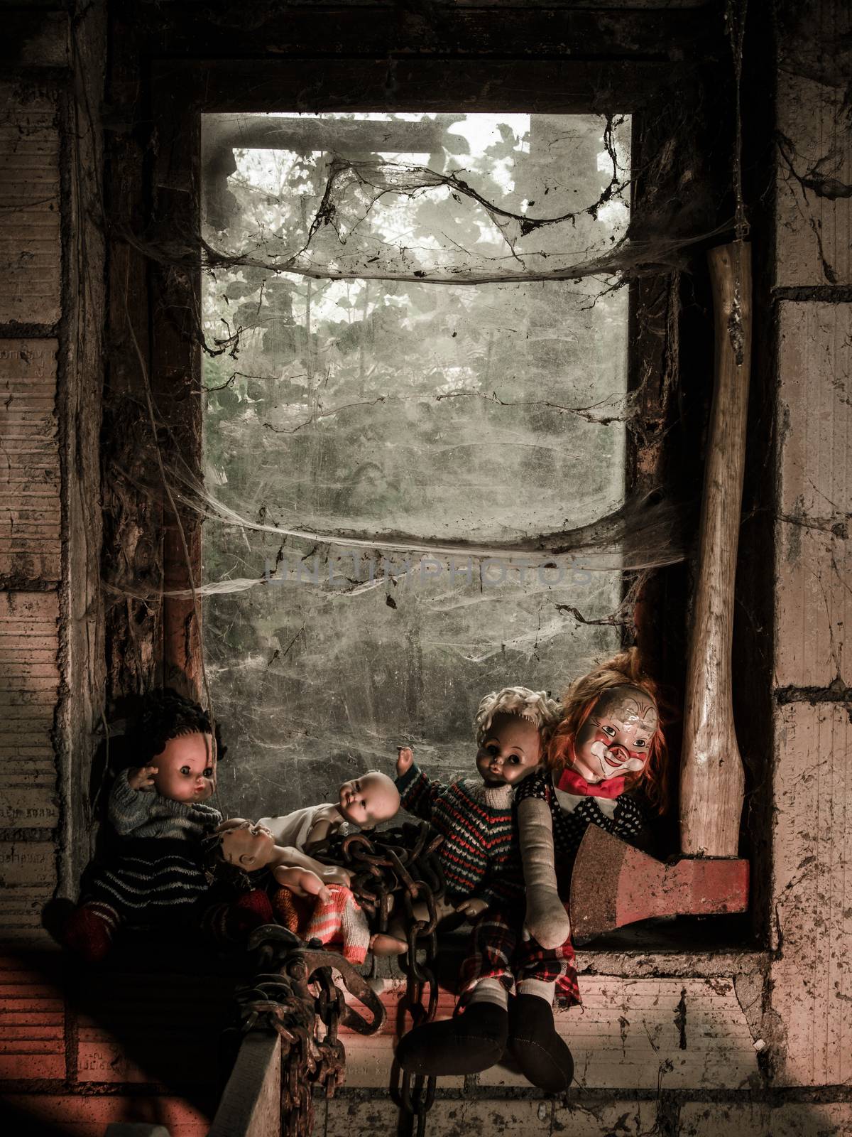 Creepy dolls and an axe by the window by sumners