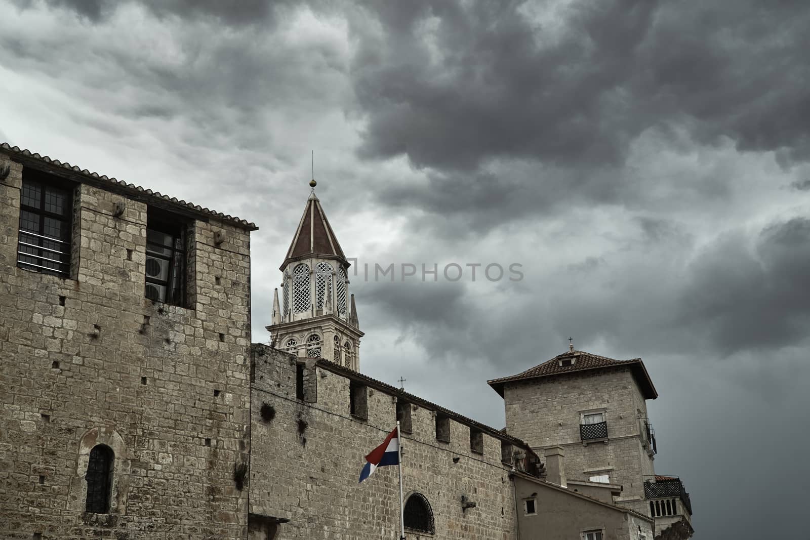Medieval battlements and cathedral tower in the town of Trogir in Croatia
