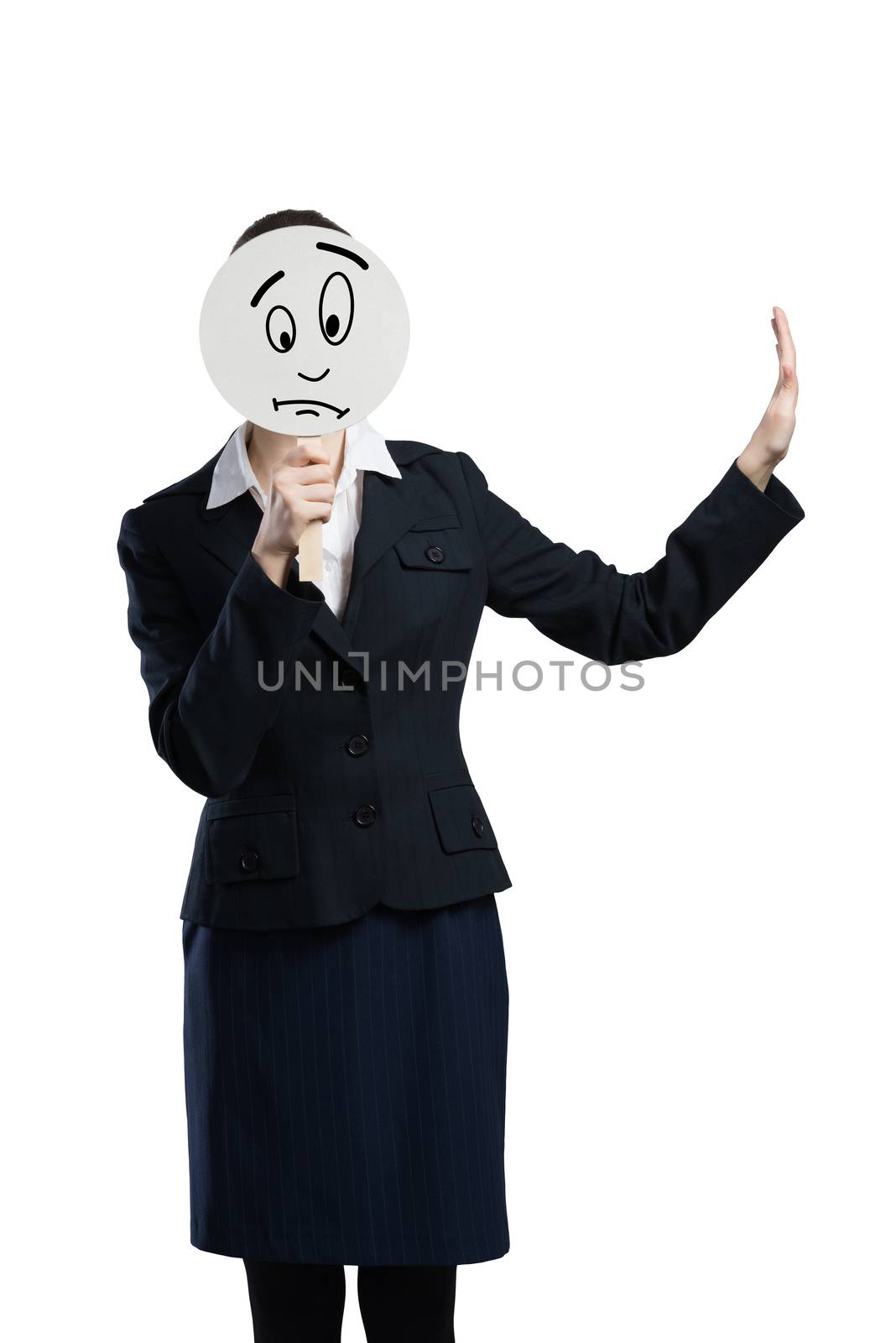 Businesswoman hiding her face behind round banner with sad smiley