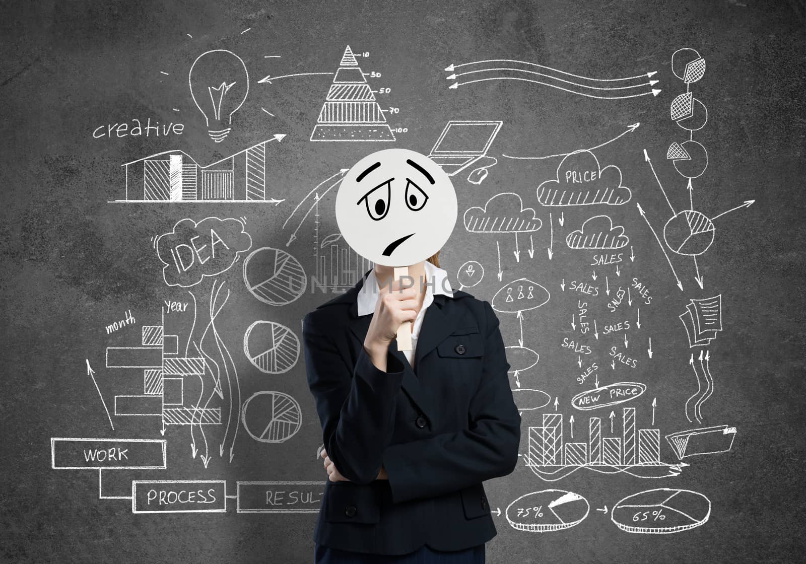 Businesswoman and graphs at background hiding her face behind mask