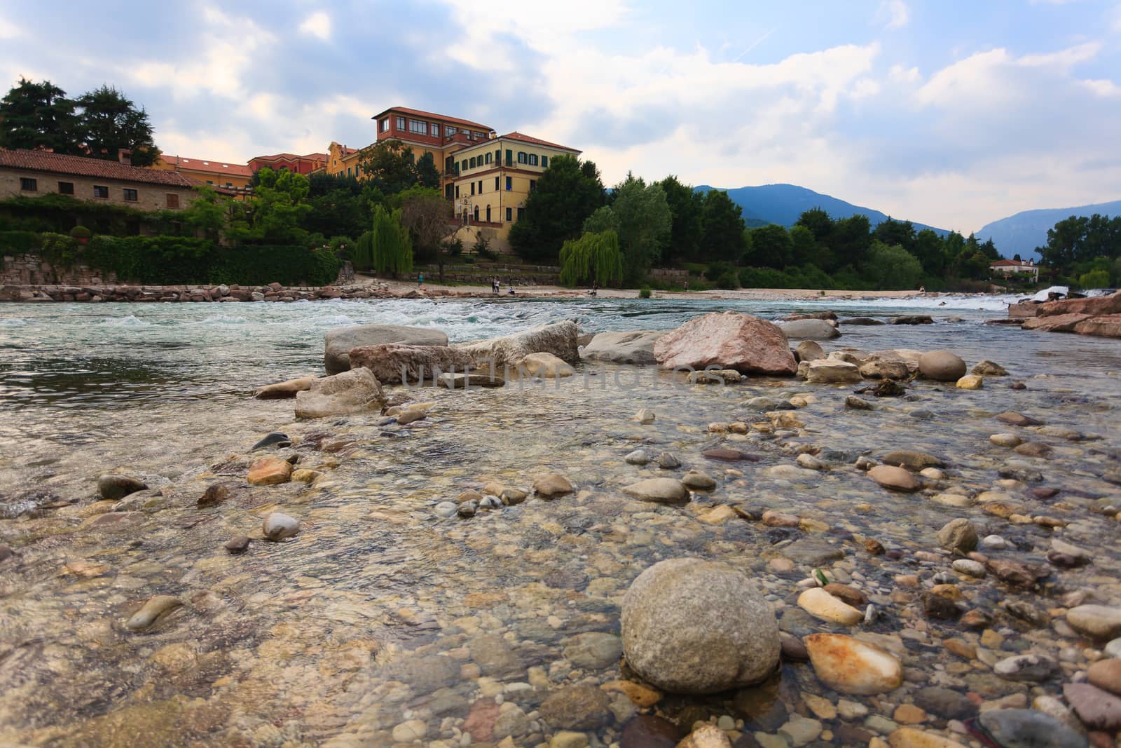Brenta river flowing, Bassano del Grappa panorama, Italy