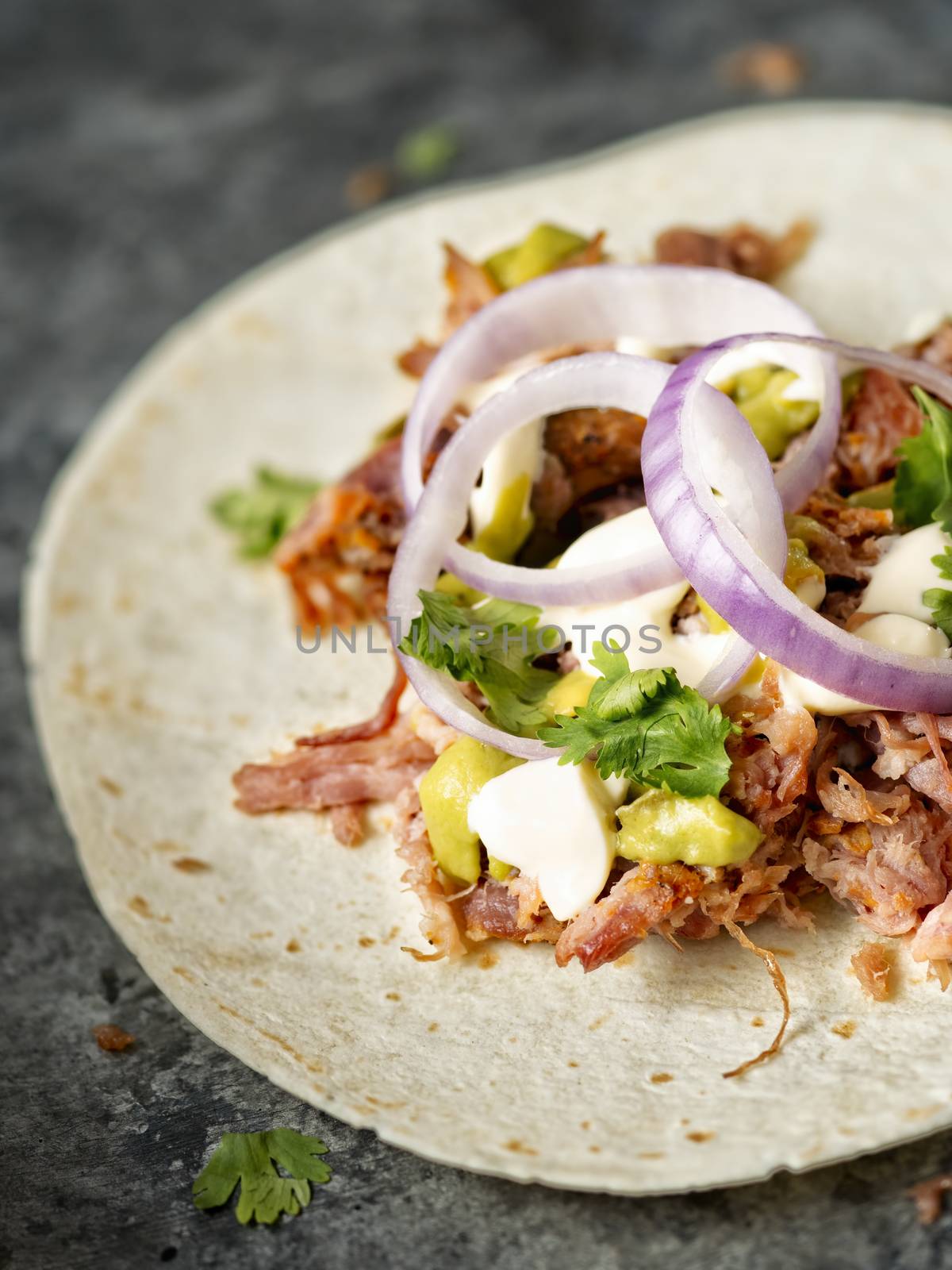 close up of rustic mexican american pulled pork tacos