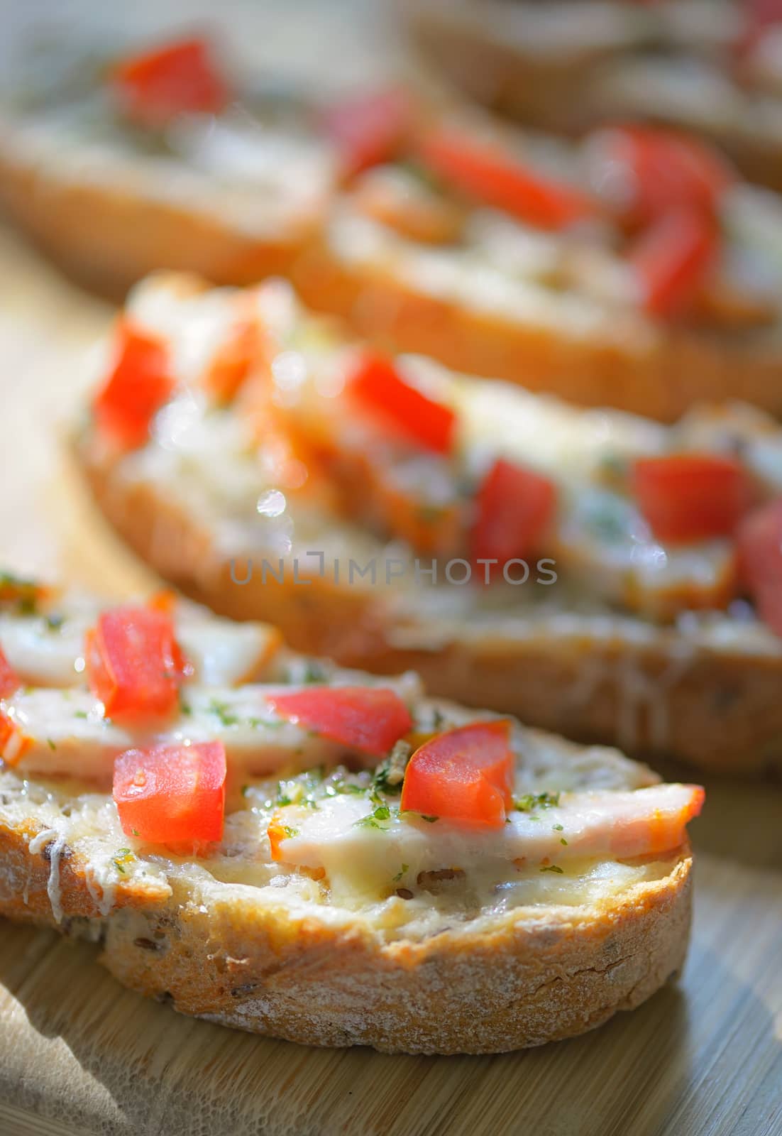 Bruschetta with tomato and chicken meat