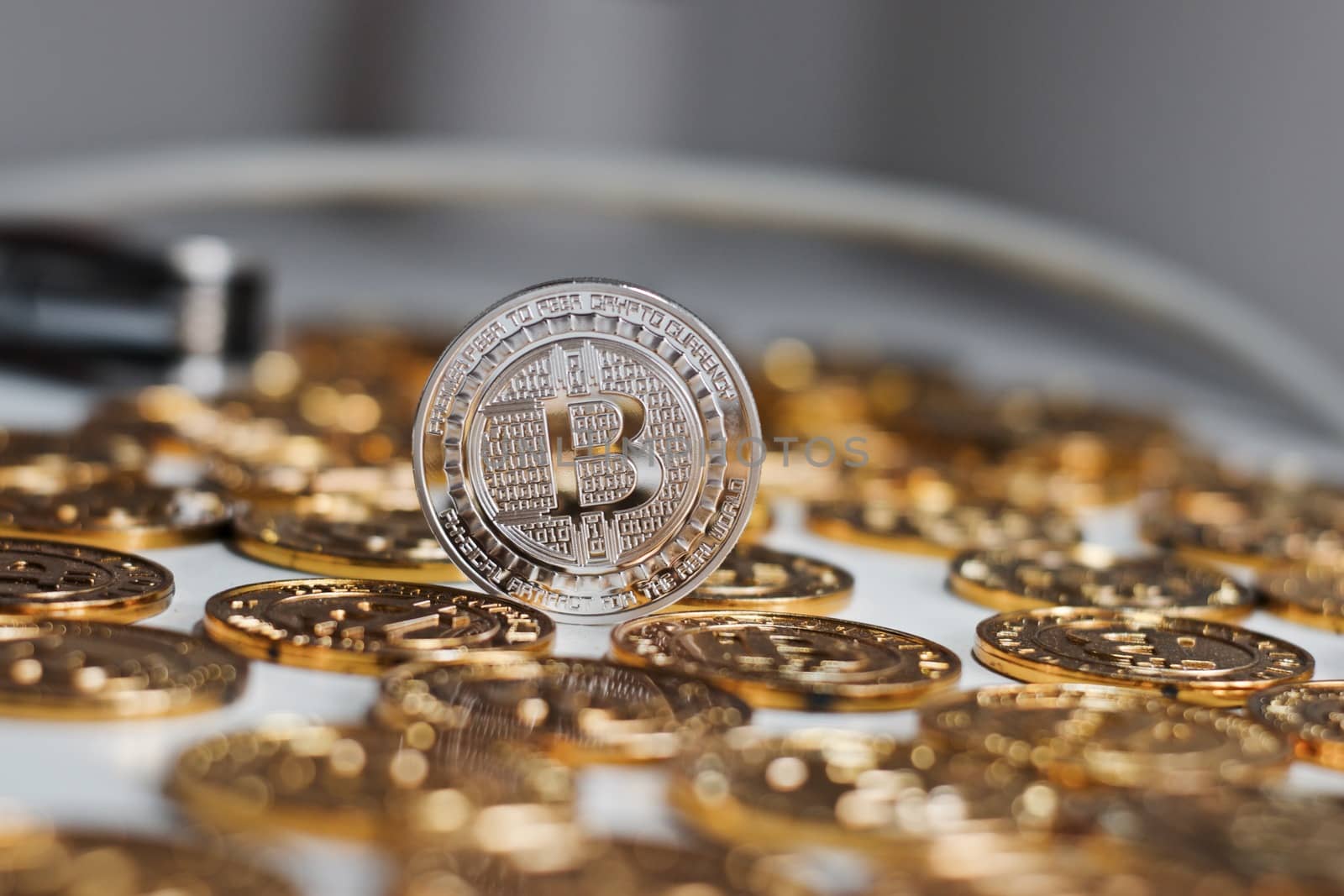 Cryptocurrency physical metal bitcoin coin. Digital currency virtual money concept.